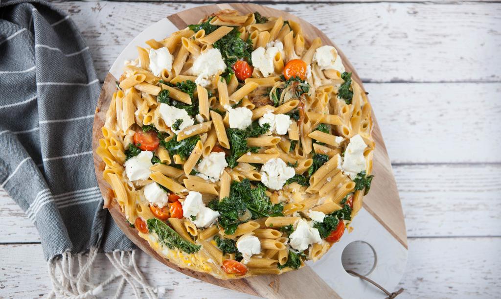 Pulse Pasta Frittata with Kale & Goats Cheese 500g packet San Remo Pulse Pasta Chickpea Spirals 2 tbsp extra virgin olive oil 1 brown onion, thinly sliced 250g punnet cherry tomatoes, halved 1 bunch
