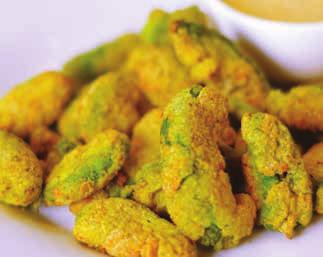 Avocado Fries 22 2 avocados, not fully ripe juice of 1 lime salt & pepper 1 egg cup flour 1/2 cup panko breadcrumbs Cut avocados in half, lengthwise. Then cut into slices and remove from the skin.