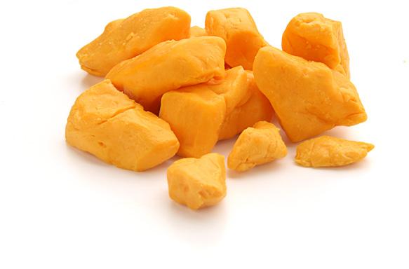 Cheddar s natural color is creamy white, but it is often turned bright orange with the addition of annatto a tasteless, odorless vegetable coloring.