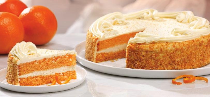decorated with rich cream cheese frosting and a garnish of orange cake crumbs along the sides. (32 oz.