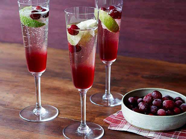 Recipes Cranberry Champagne Cocktail Ingredients 1 -ounce cranberry juice (sweetened) 1 wedge lime Champagne or sparkling wine Cranberries (frozen)