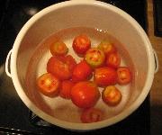 3. Place tomatoes into boiling water being careful not to splash hot water. 4. 5.