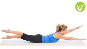 slightly behind the hips, push hips up and hold.