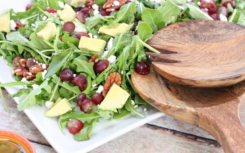 GRAPE, AVOCADO & ARUGULA SALAD SALAD 6 cups fresh arugula 2 cups red or green seedless grapes, halved 1 avocado, pitted and diced 1/2 cup goat cheese, crumbled 1/2 cup walnuts and/or pecans, chopped