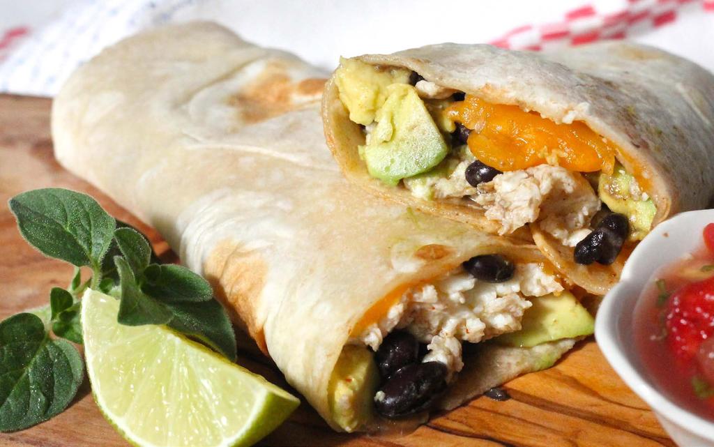 BLACK BEAN & EGG WHITE BREAKFAST BURRITOS 4 whole wheat 8-inch tortillas 1 can low-sodium black beans, rinsed and drained 6 large eggs, whites only 1 tomato, diced 2 garlic cloves, minced 1/2 white