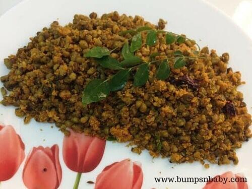 Green gram ½ cup Water 2 cups to cook Grated coconut ¼ cup Garlic 1 pod Cumin seed ¼ teaspoon Chilli powder ¼ teaspoon Turmeric powder ¼ teaspoon Small onion 2 Mustard seeds a few Curry leaves a few