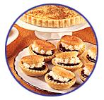 Oysters 175g sweetened shortcrust pastry Filling 65g margarine 65g caster sugar 75g ground almonds 1 medium egg, beaten few drops of almond essence Jam and butter icing Heat oven to