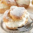 Cream Puffs & Eclairs - MINI Two bite versions of our Classic custard filled Eclairs or our pastry cream filled Cream Puffs. Mini Eclairs...dozen...$21.