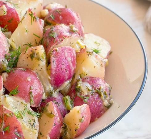 Potato Salad 3 Ib. Red potato washed and cut in cubes 1 red onion chopped 1 cup cooked chickpeas 3 stalks chopped celery 1 cup cooked peas 1/2 cup cooked corn 2 tbsp. parsley 2 tbsp.