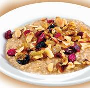 SIMPLE & FIT Super Fruit Oatmeal with Almonds & Walnuts A bowl of freshly made toasted Quaker Oats lightly sweetened with cinnamon sugar and topped with almonds, walnuts and a blend of five dried