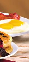 99 650-820 Calories Plato de Panqueques Rooty Tooty Fresh N Fruity * Two eggs, two bacon strips, two pork sausage links and two buttermilk pancakes crowned with your choice of cool strawberry