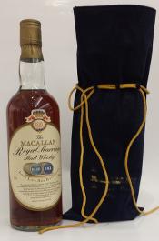 28 29 Macallan 1982 18yo A discontinued expression produced in the classic Macallan style. Lid and base of tin a bit rusty, and neck label damaged.