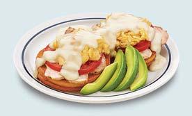 MADE TO CRACK eggspecialties Turkey & Avocado Bennie Two slices of grilled Brioche bread topped with roasted turkey, scrambled eggs, tomato, White Cheddar sauce & avocado.