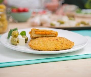 Greek Schnitzel The Greek Schnitzel is filled with a delicious Mediterranean sauce. Very tasty with pasta dishes and has a crunchy crust. A Greek Schnitzel weighs 100 grams.