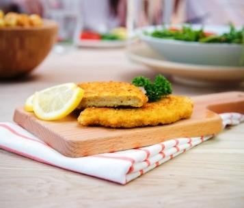 Schnitzel The Schnitzel is a crispy breaded plant-based protein food product with a delicious taste that goes well with a meal accompanied by potatoes and vegetables, for instance.