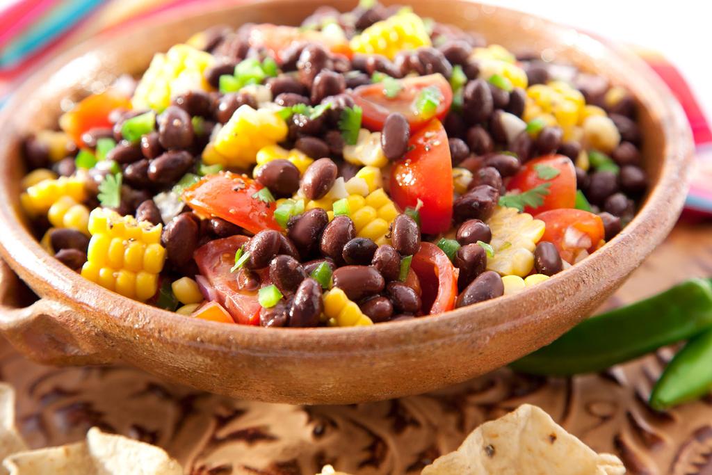 Black Bean and Corn Salad This combination of sweet corn, black beans, tomatoes, peppers, and limes is packed with flavor and nutrients!