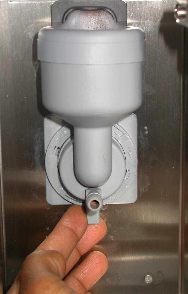 THE MIXERS ONCE A DAY 1 Open the dispenser unit door