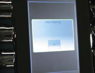 When the Start cleaning message appears on the screen, follow the machine prompts to initial the clean cycle.