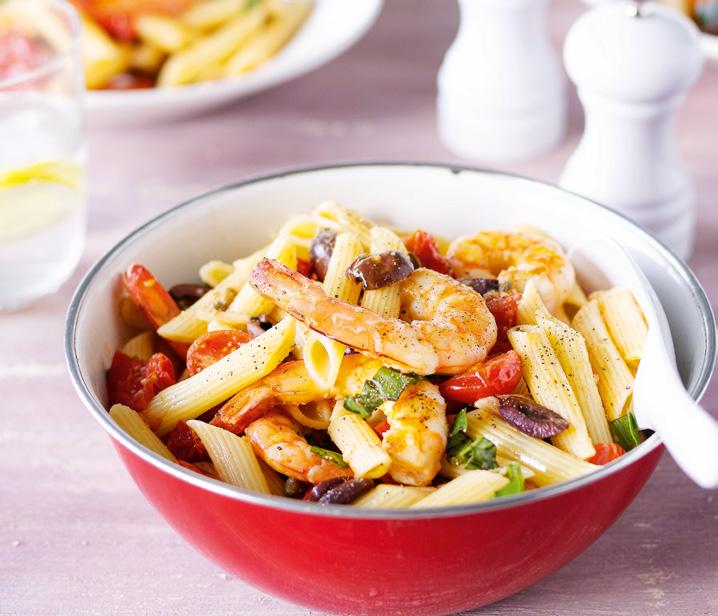 PENNE WITH PRAWNS, CAPERS AND OLIVES 350g penne pasta s 400g peeled green prawns, tails left on s 200g red grape tomatoes, halved 2 garlic cloves, thinly sliced Cook the pasta in a large saucepan of