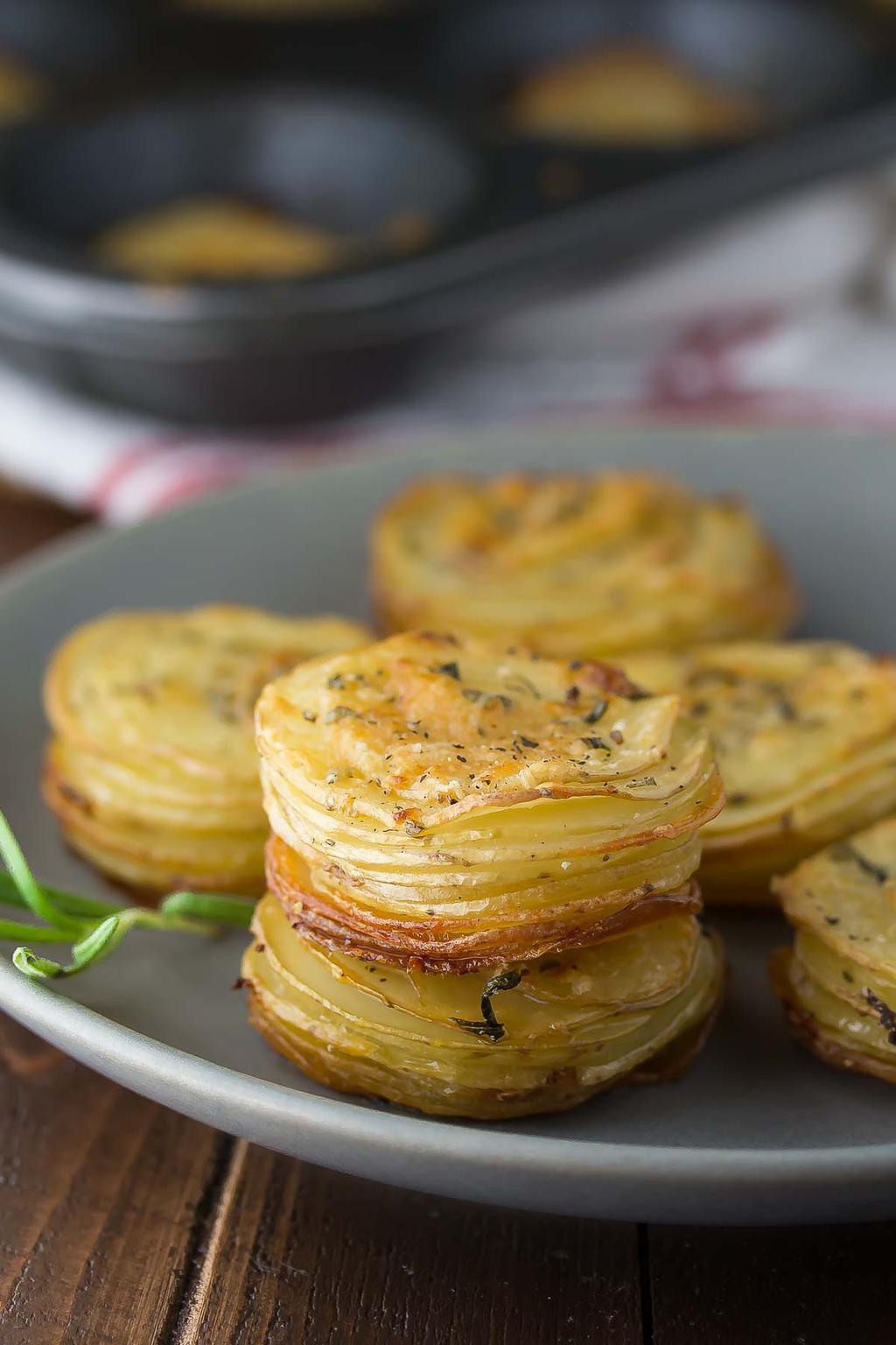 7: Parmesan & Rosemary Potato Stacks finely chopped 4 small white or Yukon gold potatoes 1 teaspoon kosher salt ¼ cup unsalted butter, melted fresh black pepper 1 tablespoon fresh rosemary, 1/4 cup