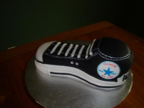 Sculpted Shoe Cake Pictured: Hightop Sneaker (left), Sneaker (right) $75.