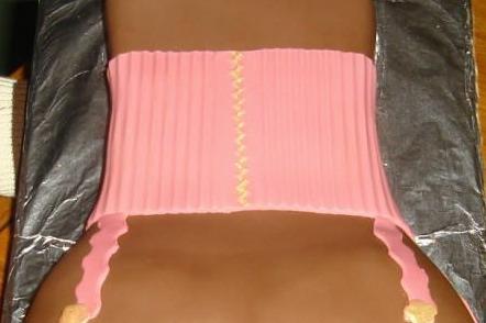 Adult Cakes Pictured: Corset back (left), Corset front (right) $75.
