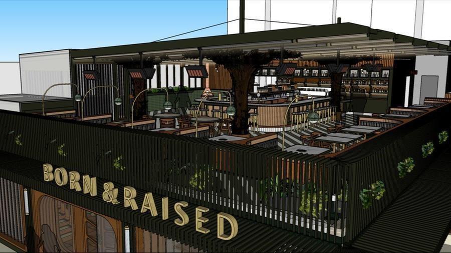 The second floor of Born & Raised, which used to be a parking lot, will combine dining, a bar and a lounge area book-ended by two copper fireplaces.