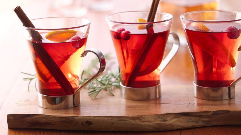 CRANBERRY CIDER 2 tablespoons 2 oranges 4 three-inch cinnamon sticks 8 cups cranberry juice 2 two-inch pieces of fresh ginger, peeled and sliced lengthwise With a knife or vegetable peeler, remove 3
