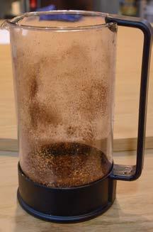 For a 2 cup french press (approx. 32oz), use 56g coffee.