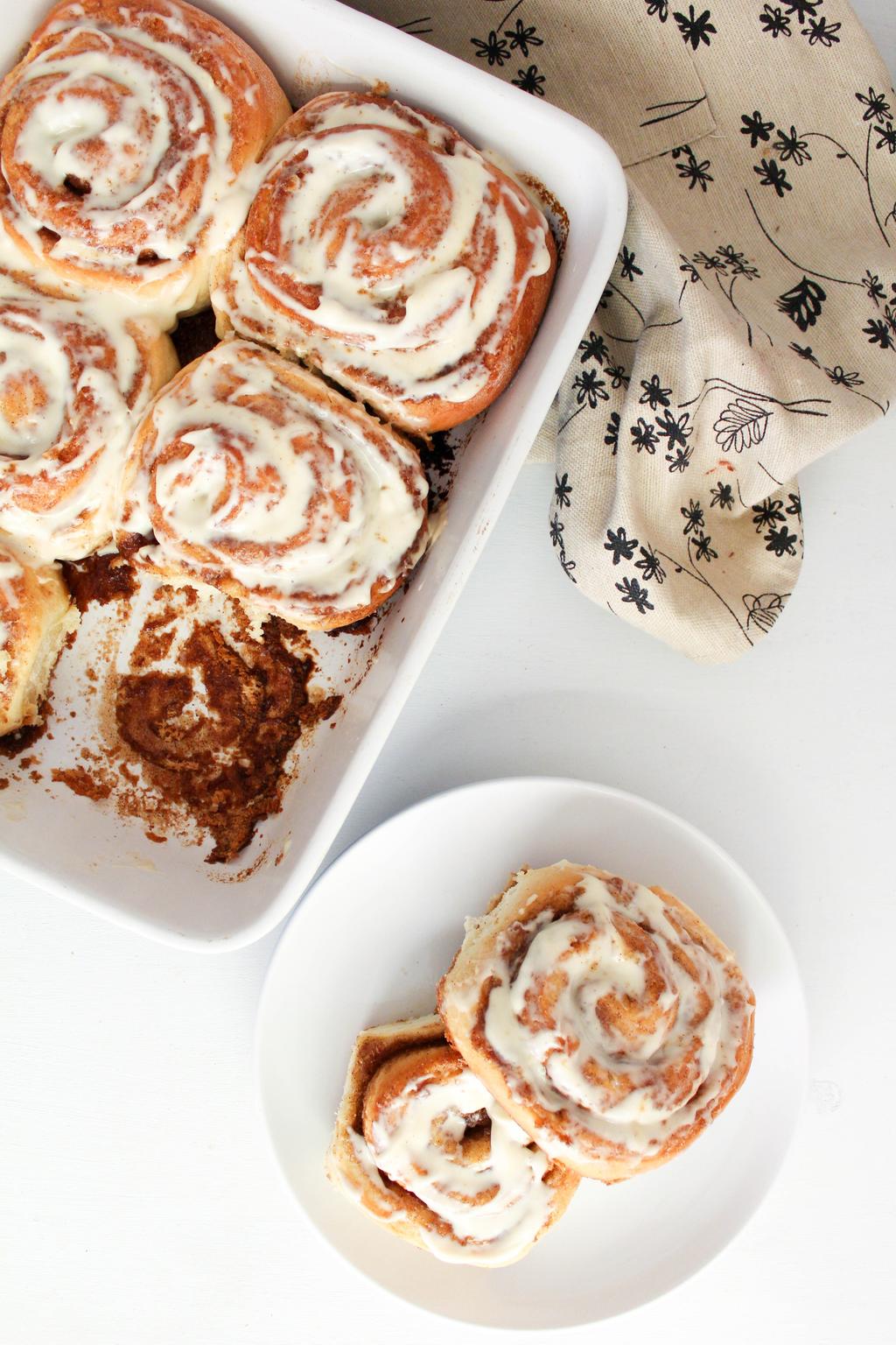 Cinnamon Rolls with a Maple Cream Cheese Frosting Author: Rachel s Eats Makes: appx 12 large rolls Ingredients: Dough: 1/2 cup warm water 1 tsp sugar 1 packet dry yeast packet 1/2 cup warm milk 1/2