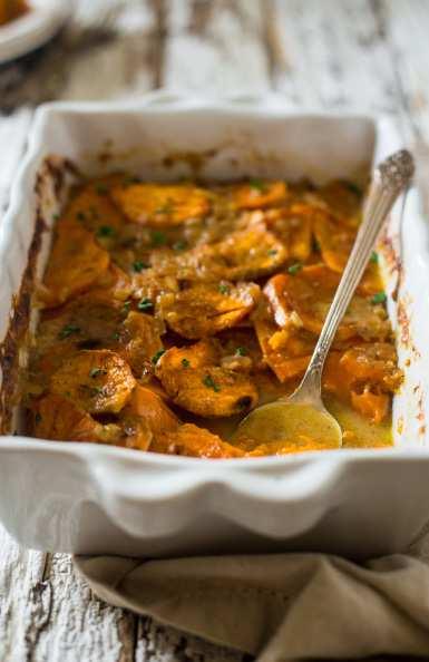 serves 6-8 scalloped sweet potatoes {Paleo + Vegan} PreP time: 10 mins cook time: 2 hours 2 Heads of garlic 2 Tbsp Olive oil + additional for roasting the garlic 1 Cup Onion, finely chopped 1 Cup + 1