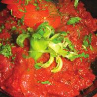 95 Tender pieces of boneless chicken cooked with tomatoes, green chillies and onions in a spicy hot sauce ~ fairly hot. Korahi tikka khyberi... 7.