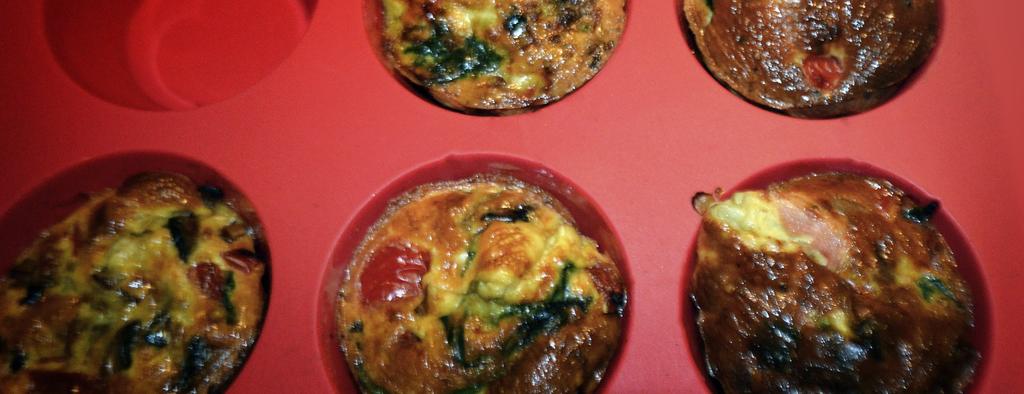 Breakfast in Bed Muffins Makes 6 muffins 6 eggs 75ml semi-skimmed milk 1 red pepper 1 red onion 50g mushrooms 100g baby spinach leaves 1 tbsp.