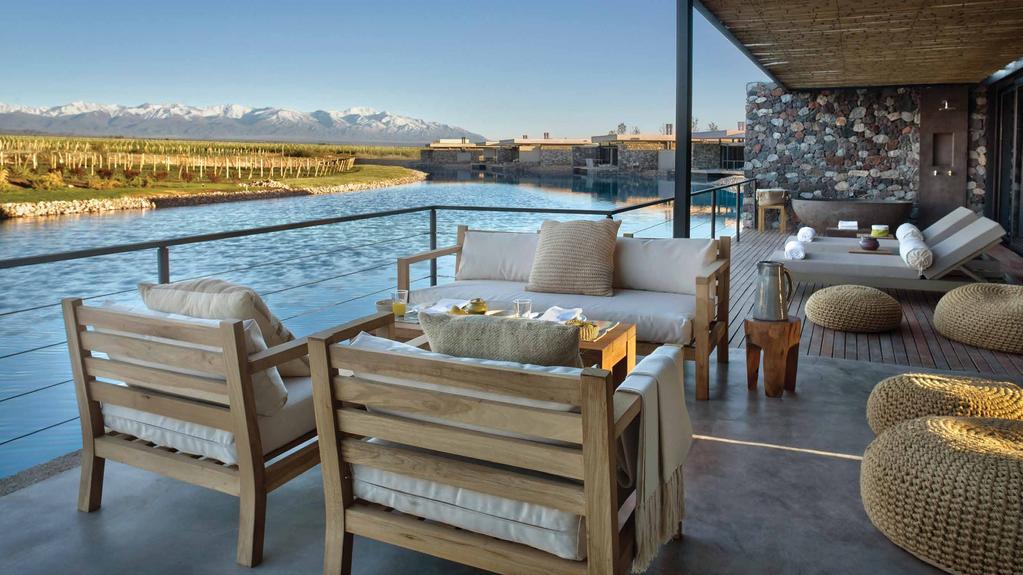 ELEGANT OUTDOOR LIVING Our Villas offer 1000-2700 square feet (90-250 square meters) of luxurious indoor/outdoor living space, with sweeping views of the Andes rising above our lush