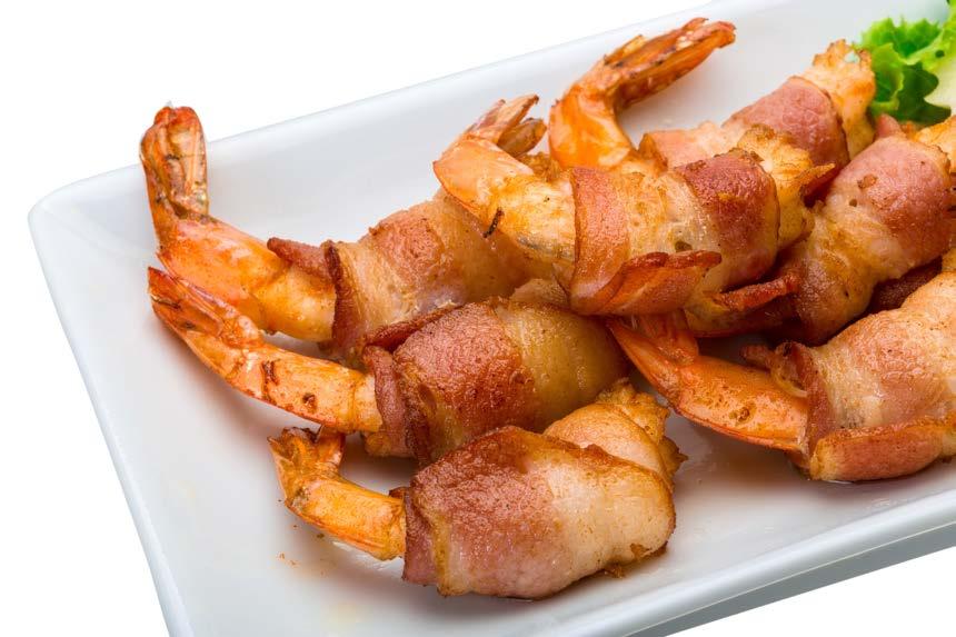 BACON WRAPPED SHRIMP 1 lb. tiger shrimp, peeled and deveined 1 lb. bacon, thinly sliced, room temperature 1.