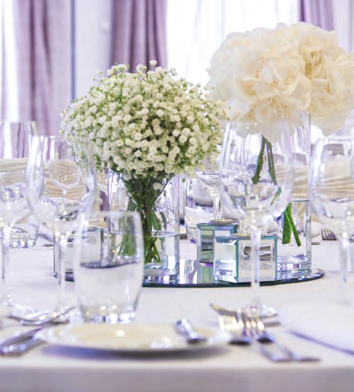 Pg. 6 Bespoke Weddings at The Merchant Hotel Luxury 75 per person Red carpet arrival Glass of Champagne for wedding couple on arrival Table numbers and display stands White linen table cloths and