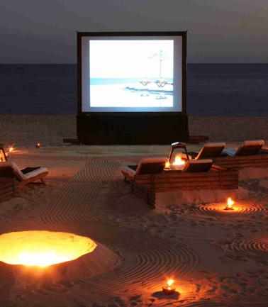 Romance Specials CINEMA ON THE BEACH FOR TWO Cinema al Paraíso, your private movie theater on the sand.