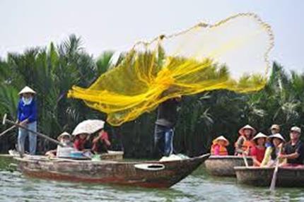 A wooden boat will transfer guests from Bach Dang dock to Cam Thanh water coconut village.