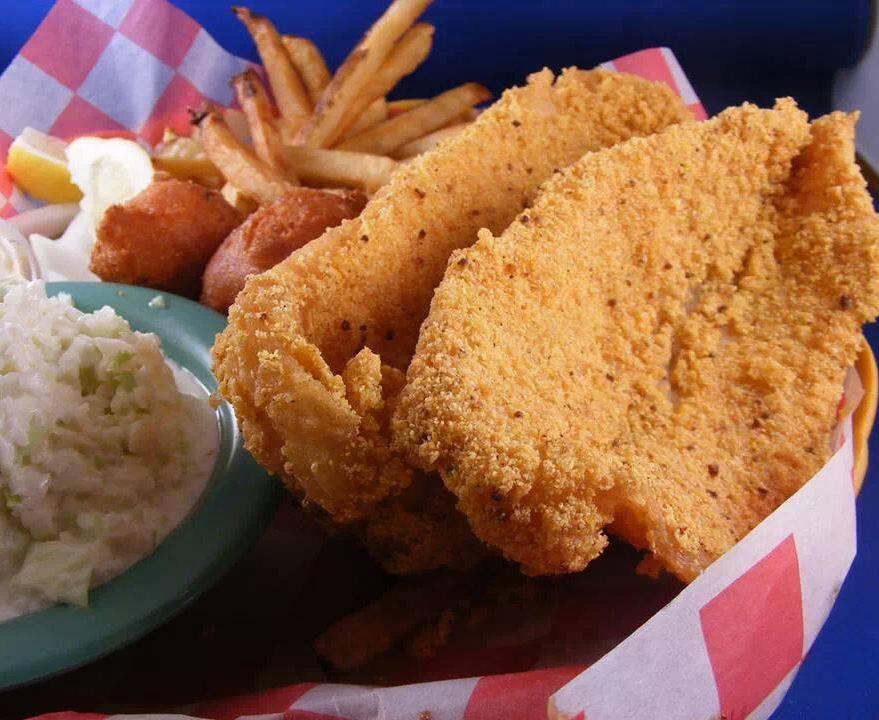Country Cooking favorites Fried Catfish Fillets 2 famous fried catfish fillets with hushpuppies, tartar sauce, coleslaw, and 1 more traditional side, tea, ice and paper goods. $10.49 $11.99/$10.99/$9.