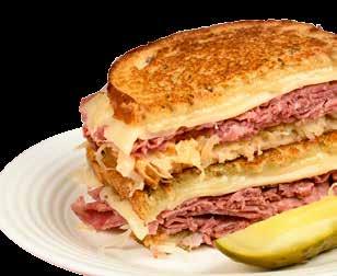 OVERSTUFFED SANWICHES Served with choice of potato, macaroni, tomato, health, cucumber salad & pickle CORNED BEEF... $9.69 (First cut... $2.00 Additional) ROAST BEEF... $9.69 TURKEY BREAST.