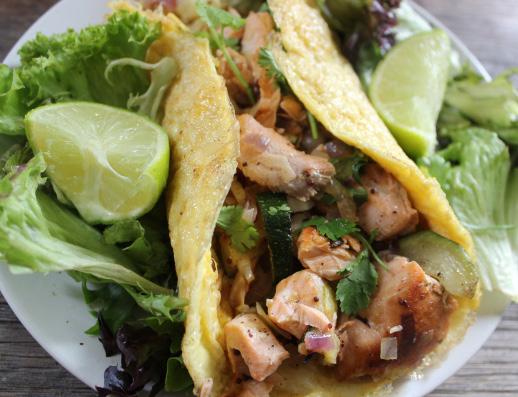Salmon burrito with cabbage & courgette 2 tsps ghee or coconut oil 1/2 a red onion, finely chopped 1 spring onion, finely sliced 60g courgette, finely chopped 100g Savoy cabbage, finely chopped 180g