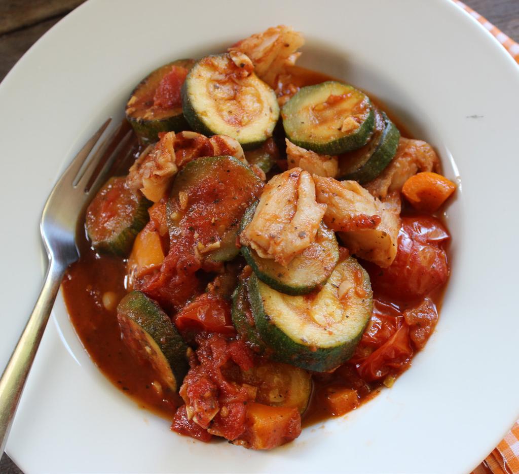 Quick fish ratatouille 1 tsp coconut oil or ghee 3 garlic cloves, finely chopped 60g bell pepper (any colour), chopped 5 vine-ripened tomatoes, chopped 3 courgettes, chopped 200g tinned chopped