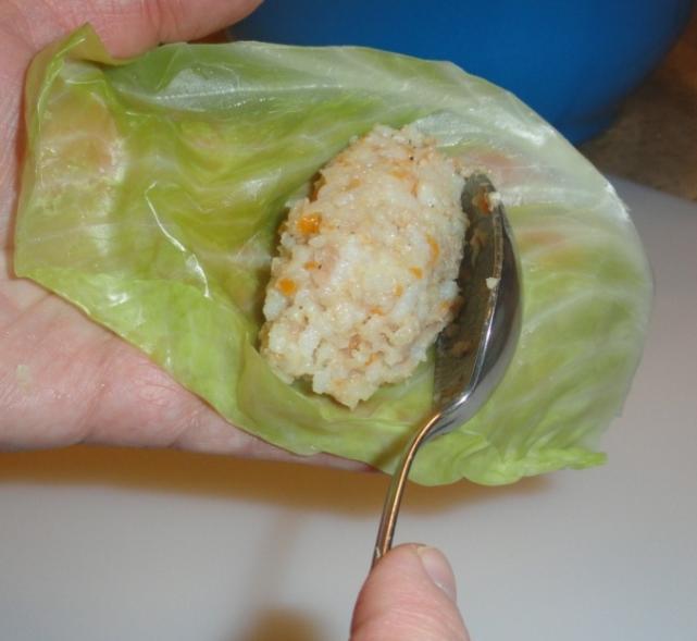 Making Cabbage Rolls Halves leaves: Put about 1 tbsp or less of stuffing, depending on