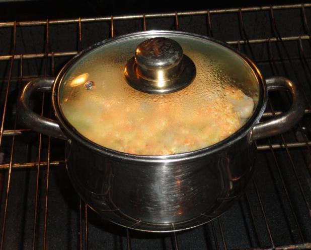 Cover with a lid. Put into the preheated oven at 350 degrees F for about 1½ hours or until it's ready.