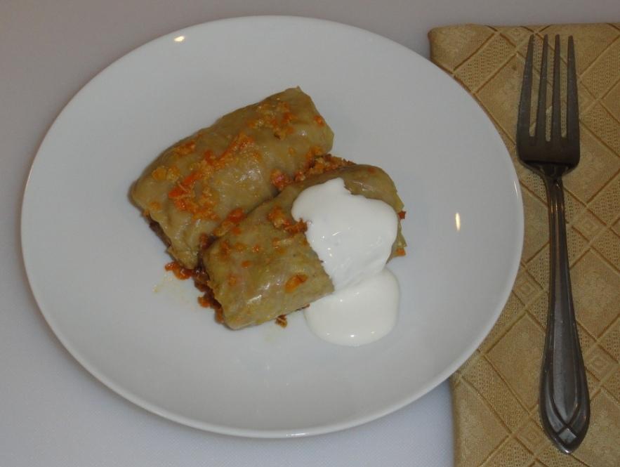 Serve cabbage rolls hot with sour cream.