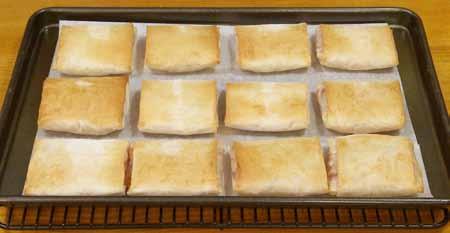 11 7 Bake the Pizza Pockets until golden brown on the outside, about 10 minutes. Let cool a little and serve warm.