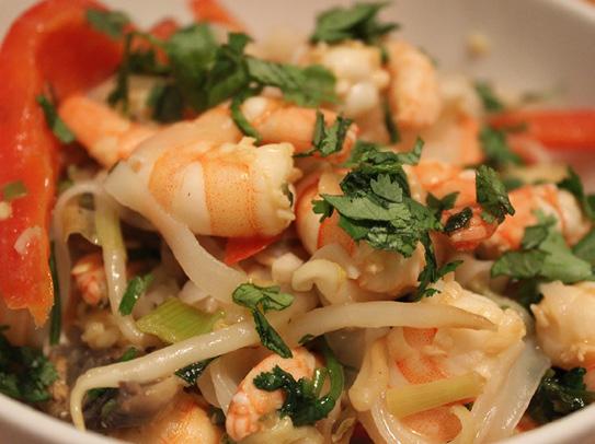 Quick and tasty stir fry 400g peeled tiger prawns or white fish 1 green chilli, finely chopped 3 garlic cloves, finely chopped 30g coriander, finely chopped juice of 1 lime 2 tbsps fish sauce 1 tbsp