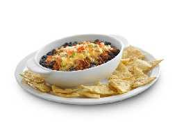 Queso Fundido, Gluten Free Prep Time: 4 min. Cook Time: 6 min. Description: Queso Fundido with black beans, chorizo sausage and topped with Stouffer s Queso Cheese dip.