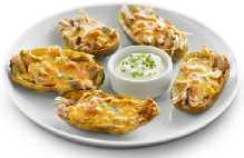 Stuffed Potato Skins, Gluten Free Prep Time: 5 min. Cook Time: 10 min. Description: Stuffed potato skins with pork carnita, topped with chipotle infused Stouffer s Queso Cheese Dip.