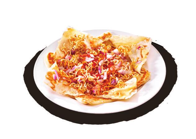 50 Prata filled with tortilla chips, red kidney beans, capsicum, onion, mozzarella cheese & chilli flakes Choice of chicken or mutton